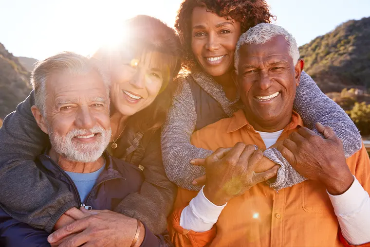 portrait of group of senior friends hiking together retirement strategies