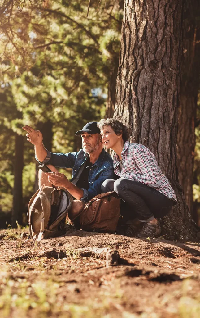 retirees taking a break during a hike retirement strategies