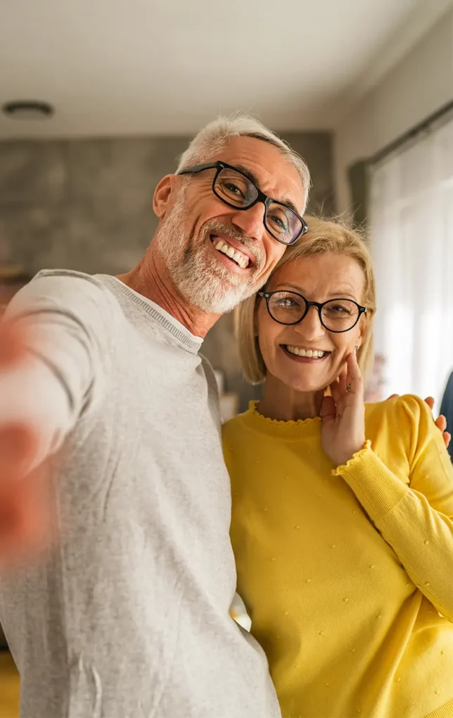 smiling retirees taking a selfie three core principles for retirement